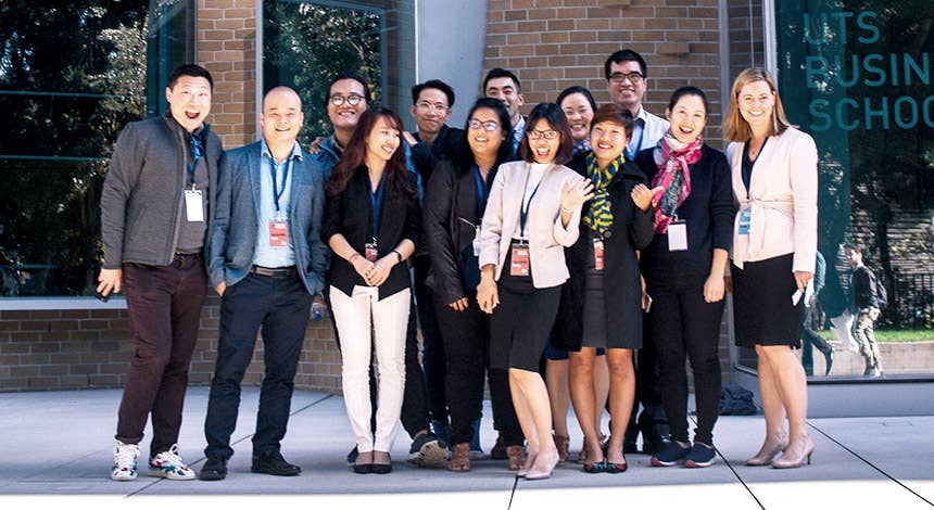 Group of 13 people in front of UTS Business School