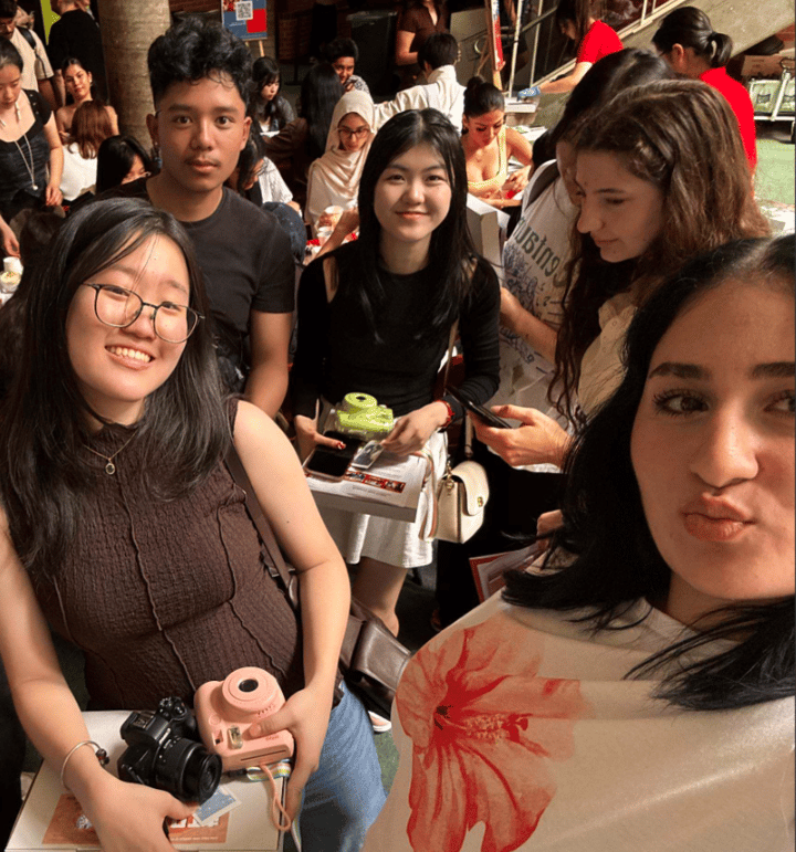 With friends at campus fair