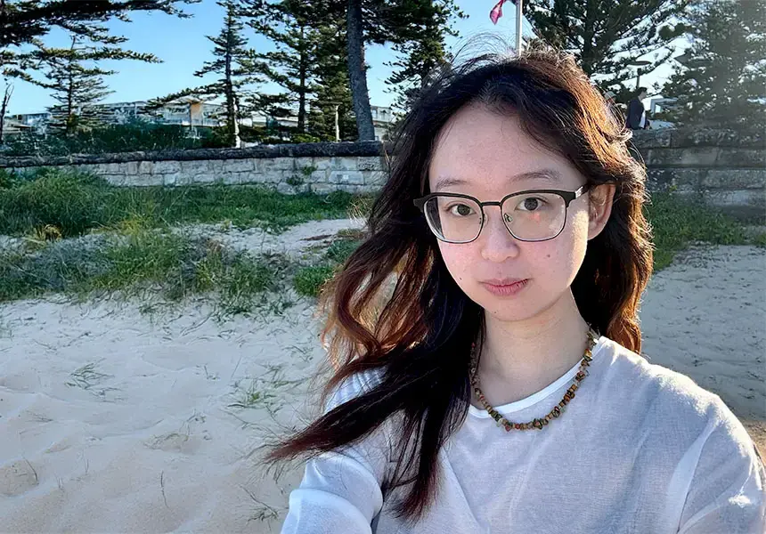 Jinyang on Manly Beach, a favourite surfing spot.